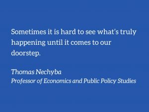 Blue background with quote from Professor Nechyba